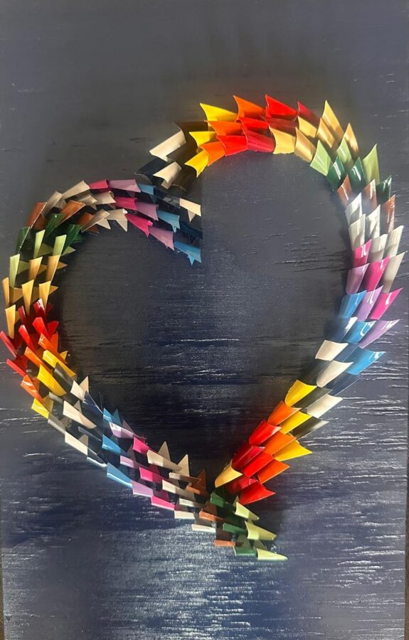 Pulsar 3 blu: cuore multicolore su fondo blu